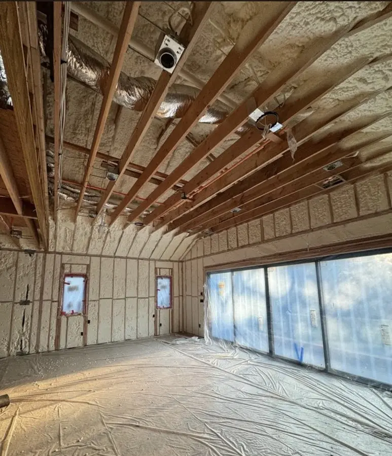 Interior walls and ceiling insulated with spray foam during new construction in Park